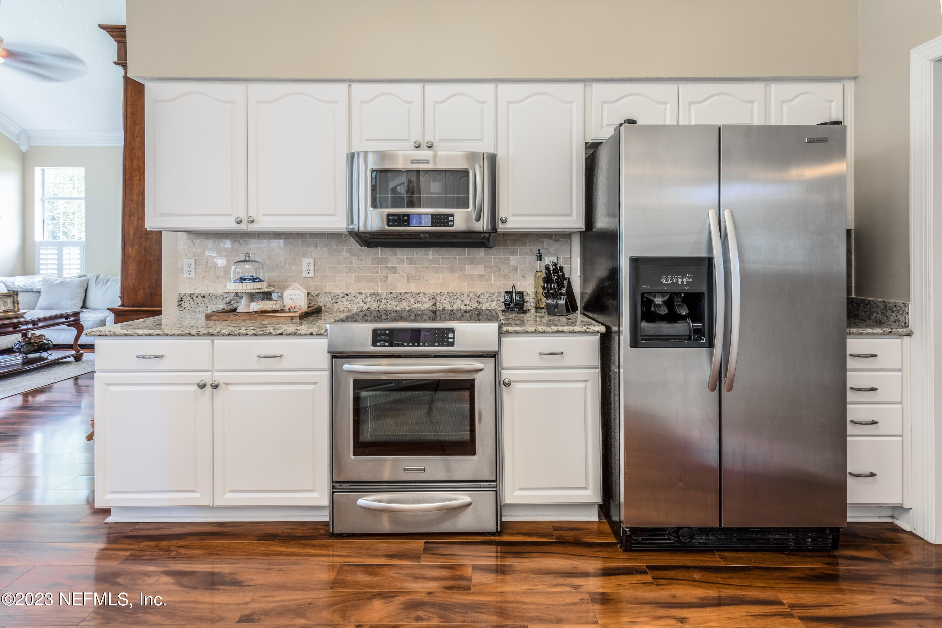 729 Cherry Grove Road Orange Park, FL 32073 - Photo 14 of 47 a kitchen with cabinets stainless steel appliances and a counter top space