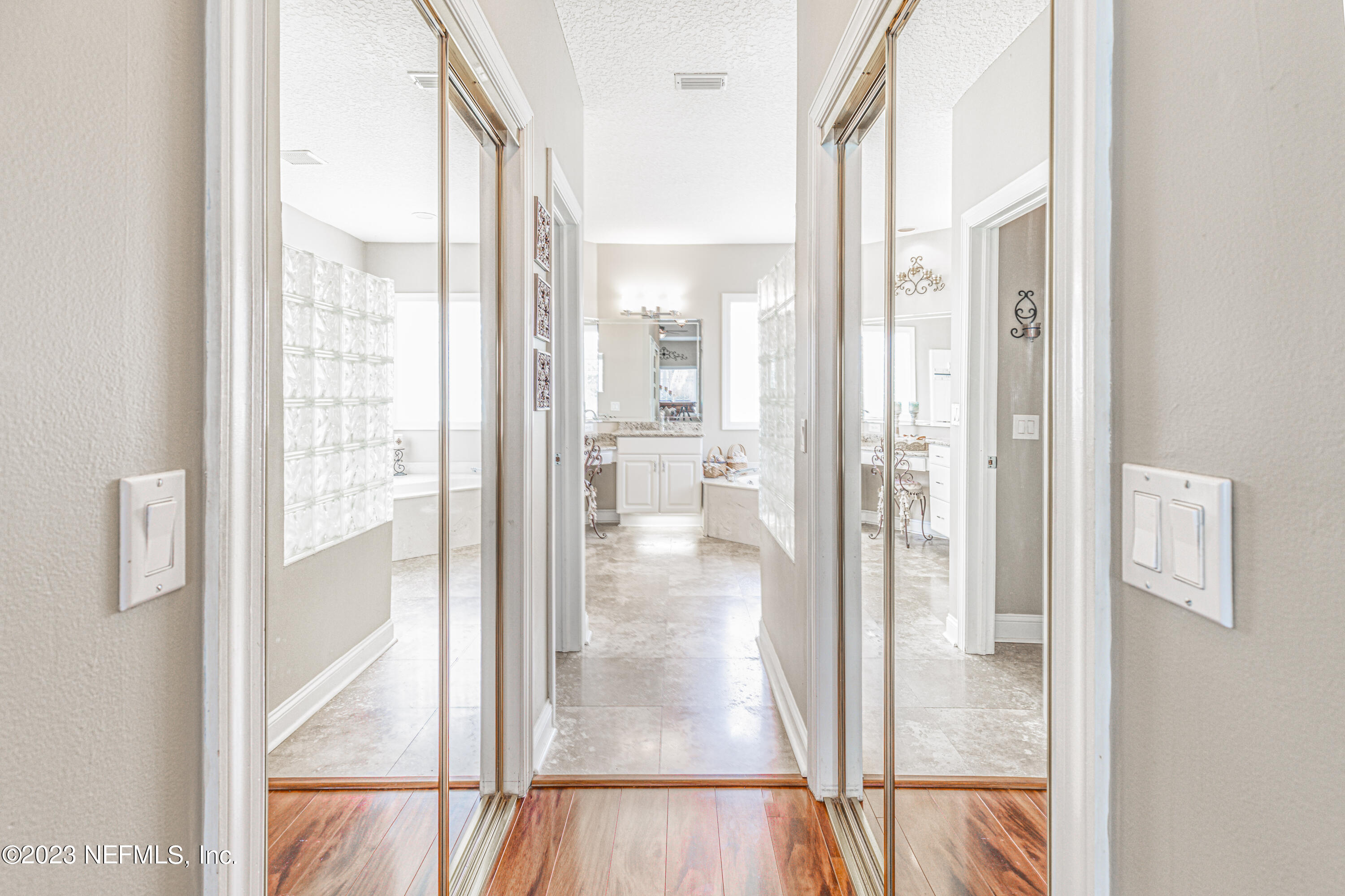 729 Cherry Grove Road Orange Park, FL 32073 - Photo 17 of 47 a bathroom with a glass shower door