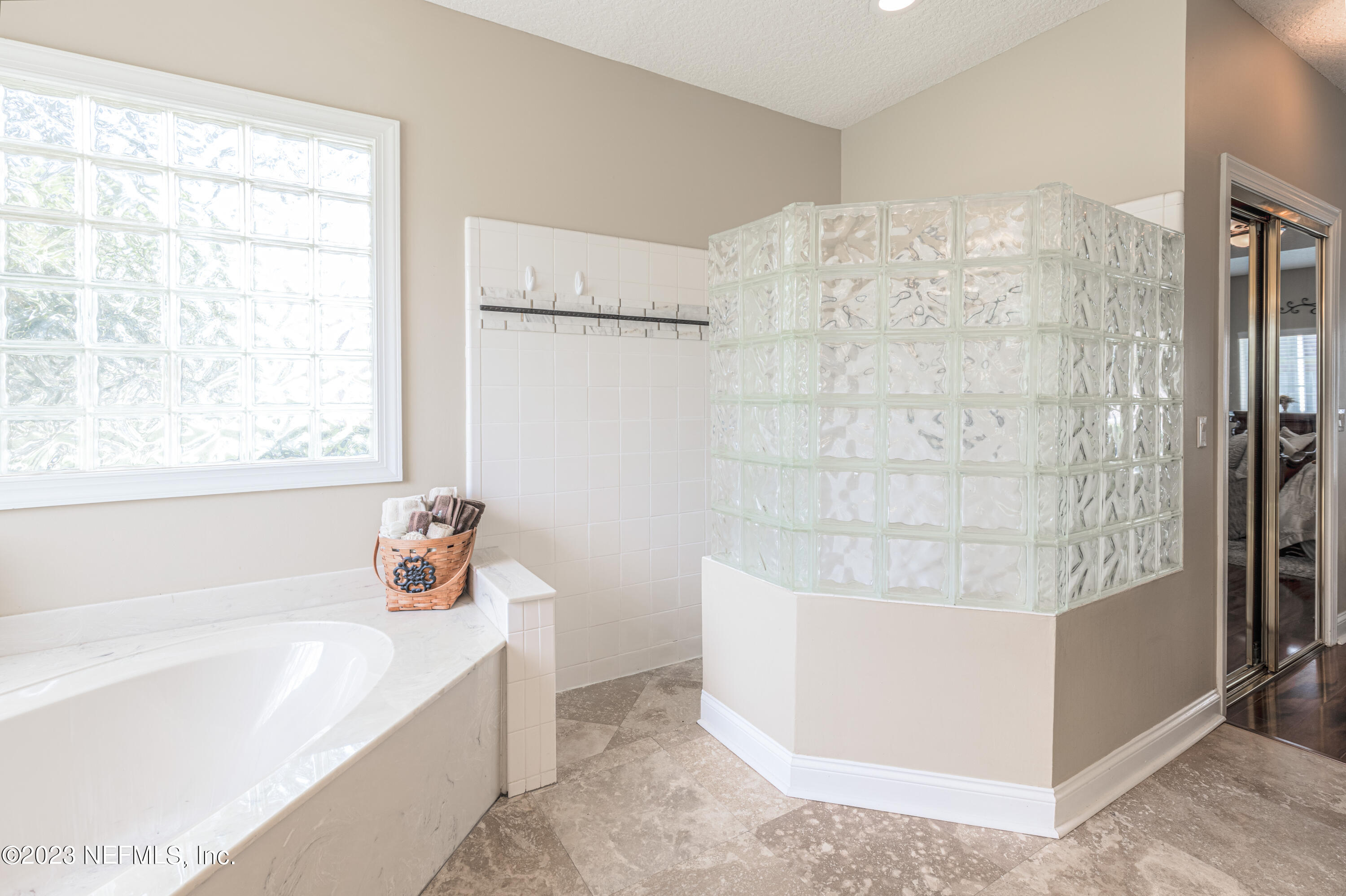 729 Cherry Grove Road Orange Park, FL 32073 - Photo 20 of 47 a bathroom with a tub and shower