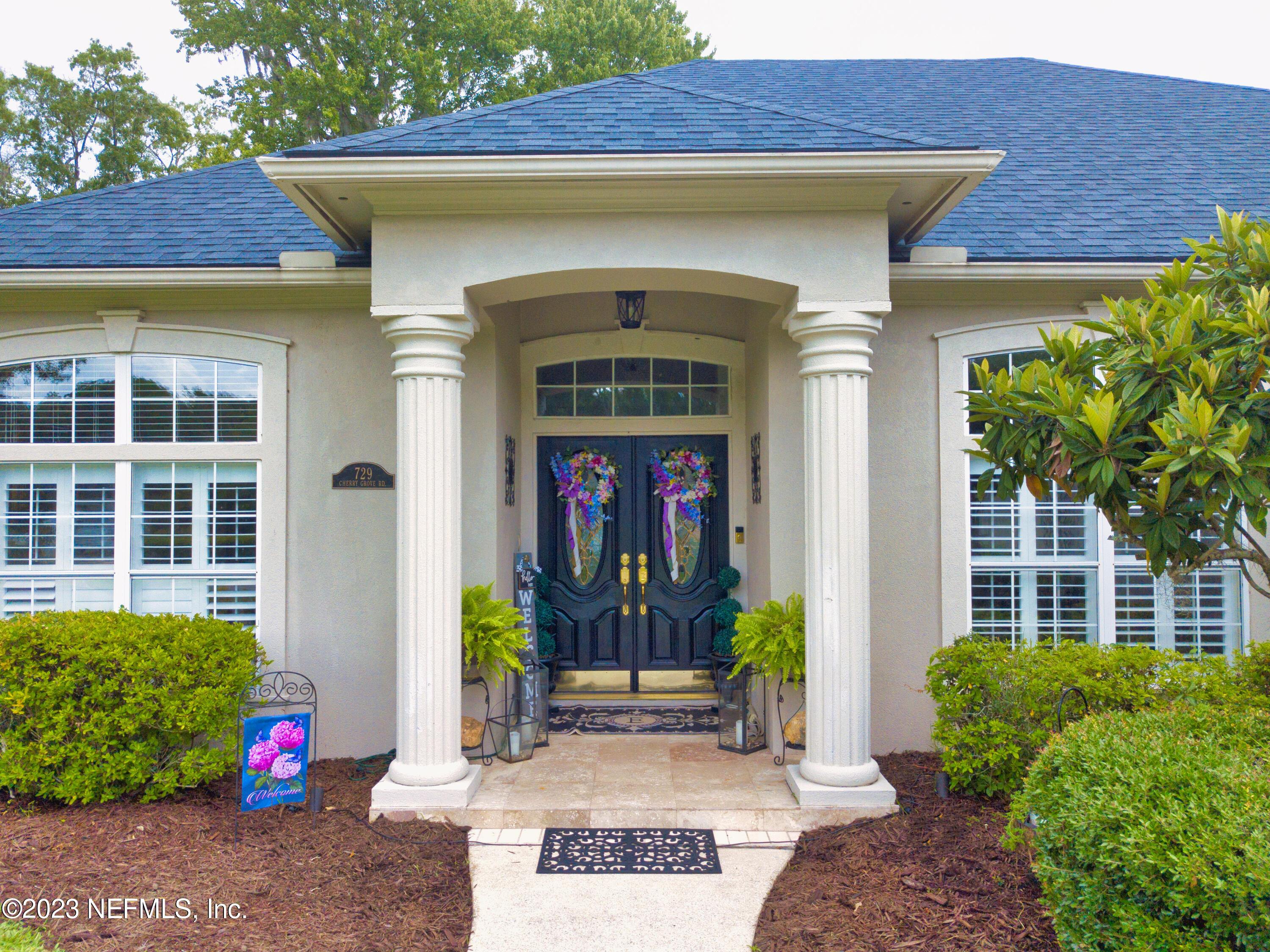 729 Cherry Grove Road Orange Park, FL 32073 - Photo 2 of 47 a front view of a house