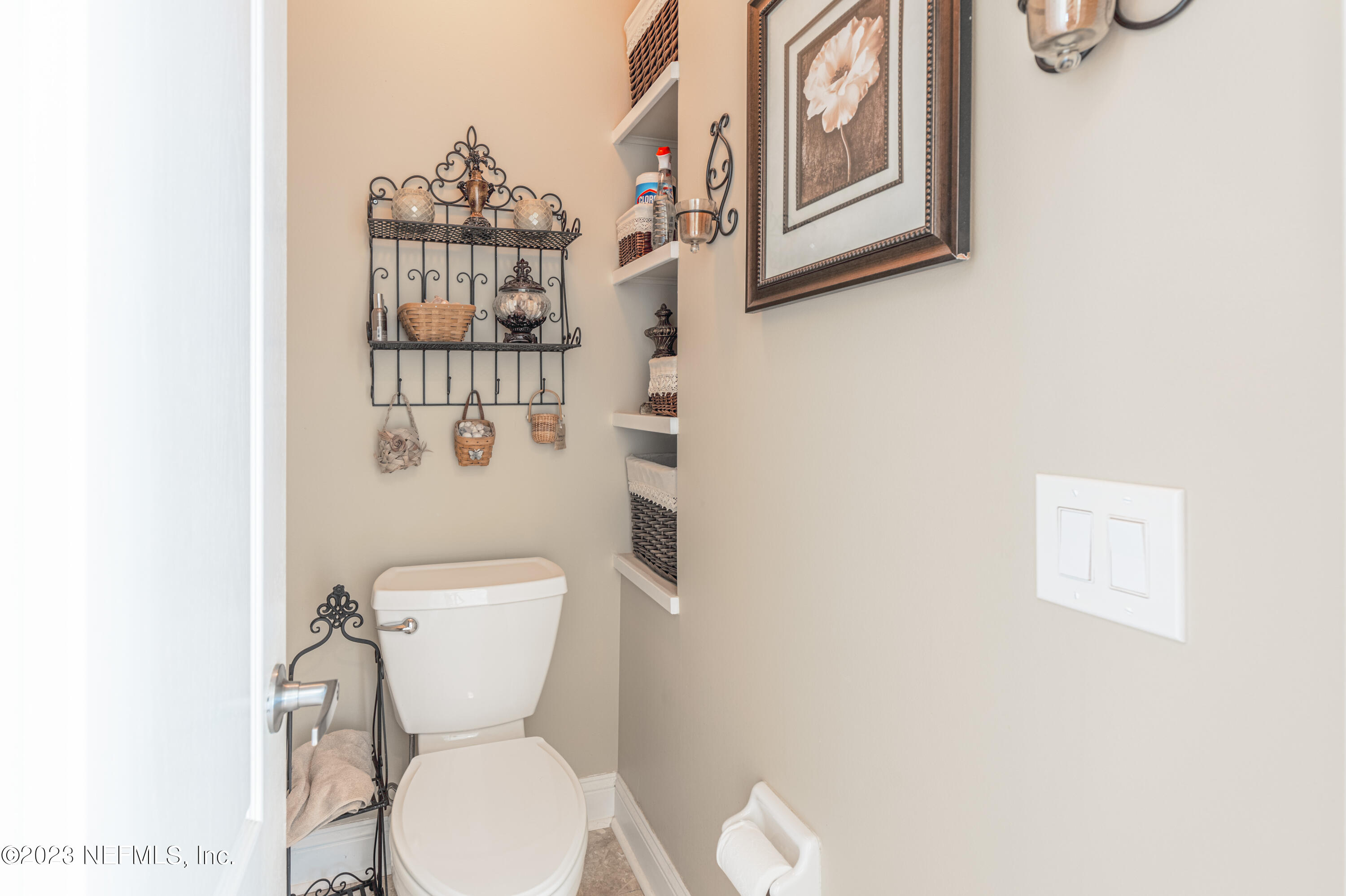 729 Cherry Grove Road Orange Park, FL 32073 - Photo 21 of 47 a white toilet sitting next to a bathroom sink