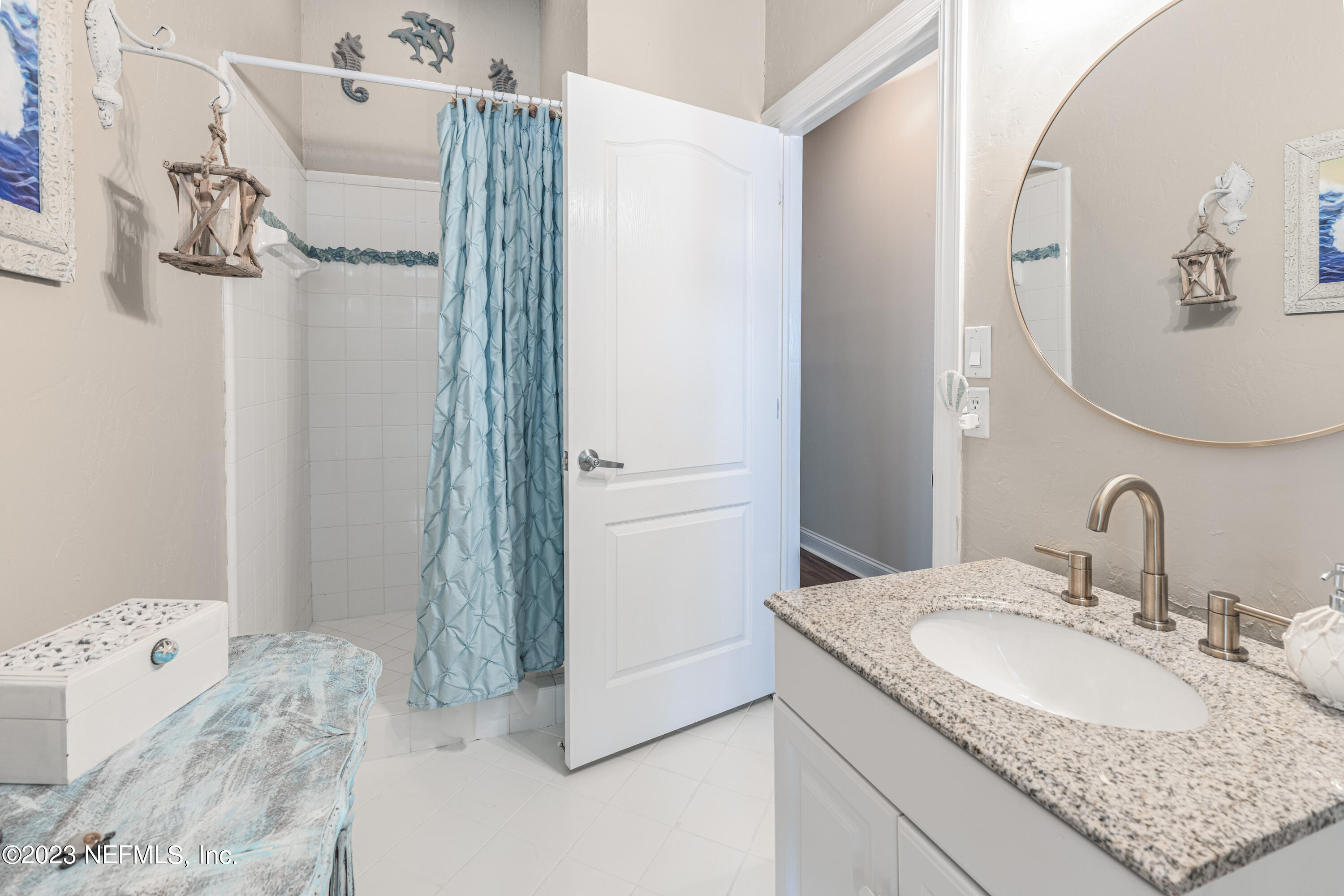 729 Cherry Grove Road Orange Park, FL 32073 - Photo 25 of 47 a bathroom with a granite countertop sink and a mirror