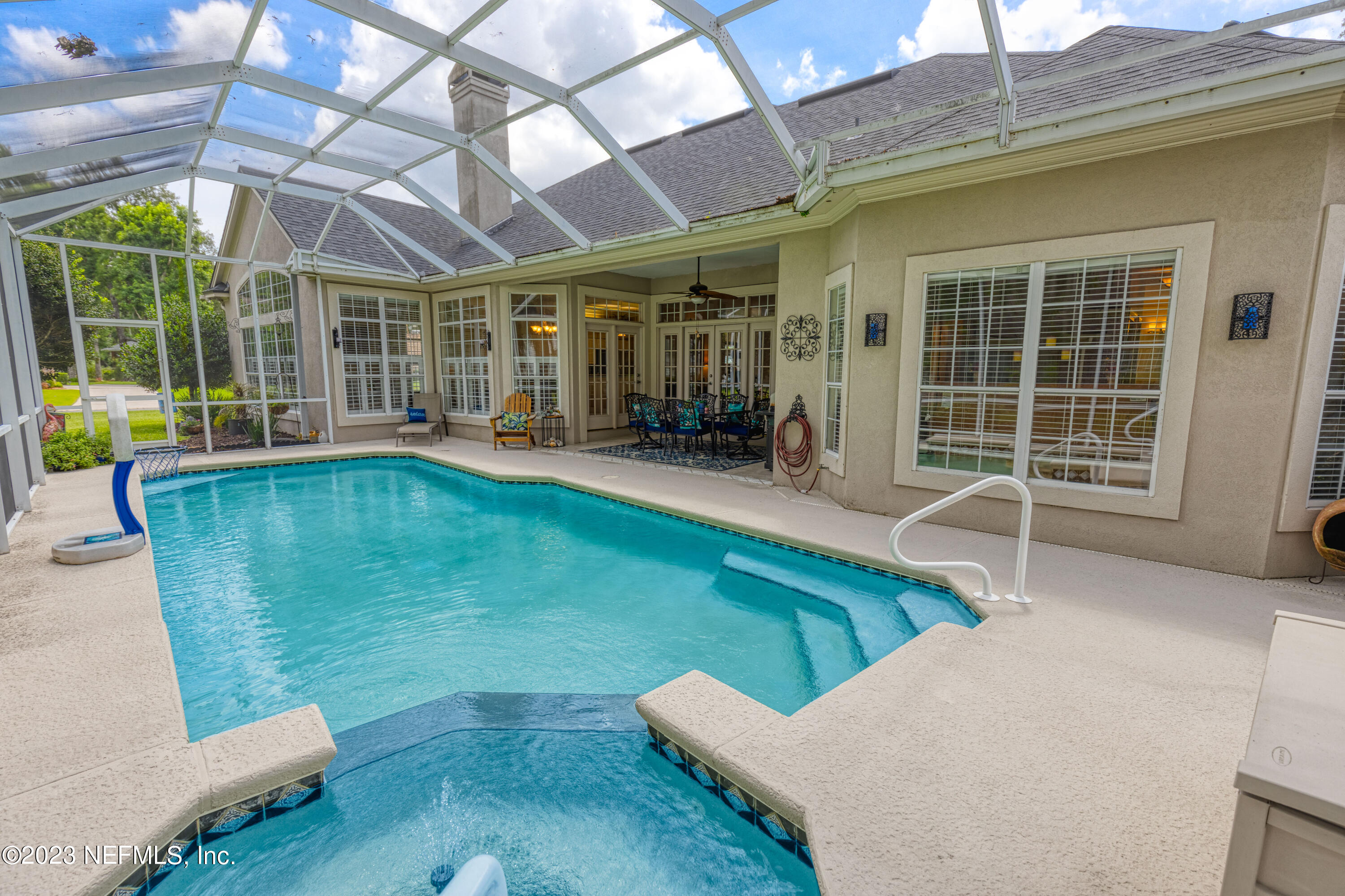 729 Cherry Grove Road Orange Park, FL 32073 - Photo 28 of 47 a house view with a sitting space and garden space