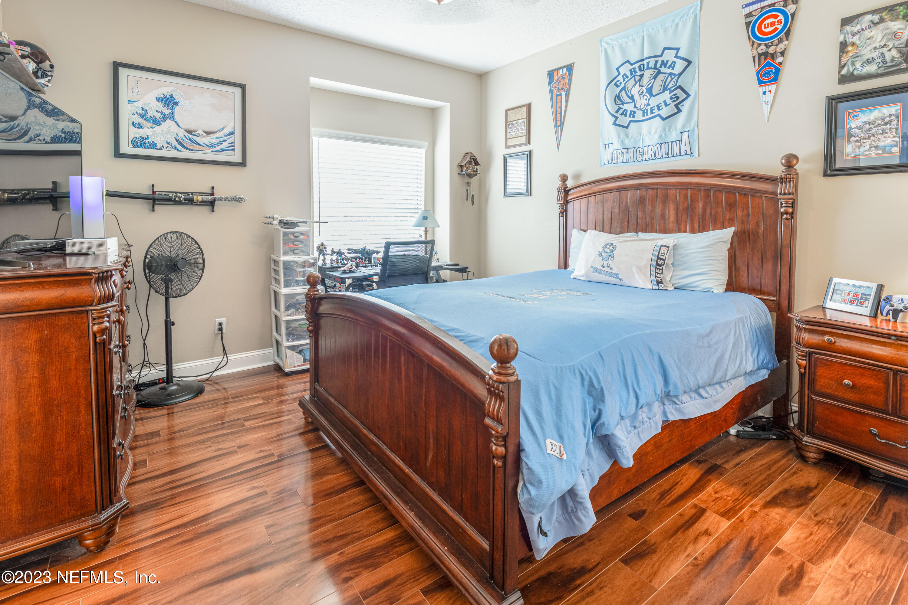 729 Cherry Grove Road Orange Park, FL 32073 - Photo 30 of 47 a bedroom with furniture and a baby crib