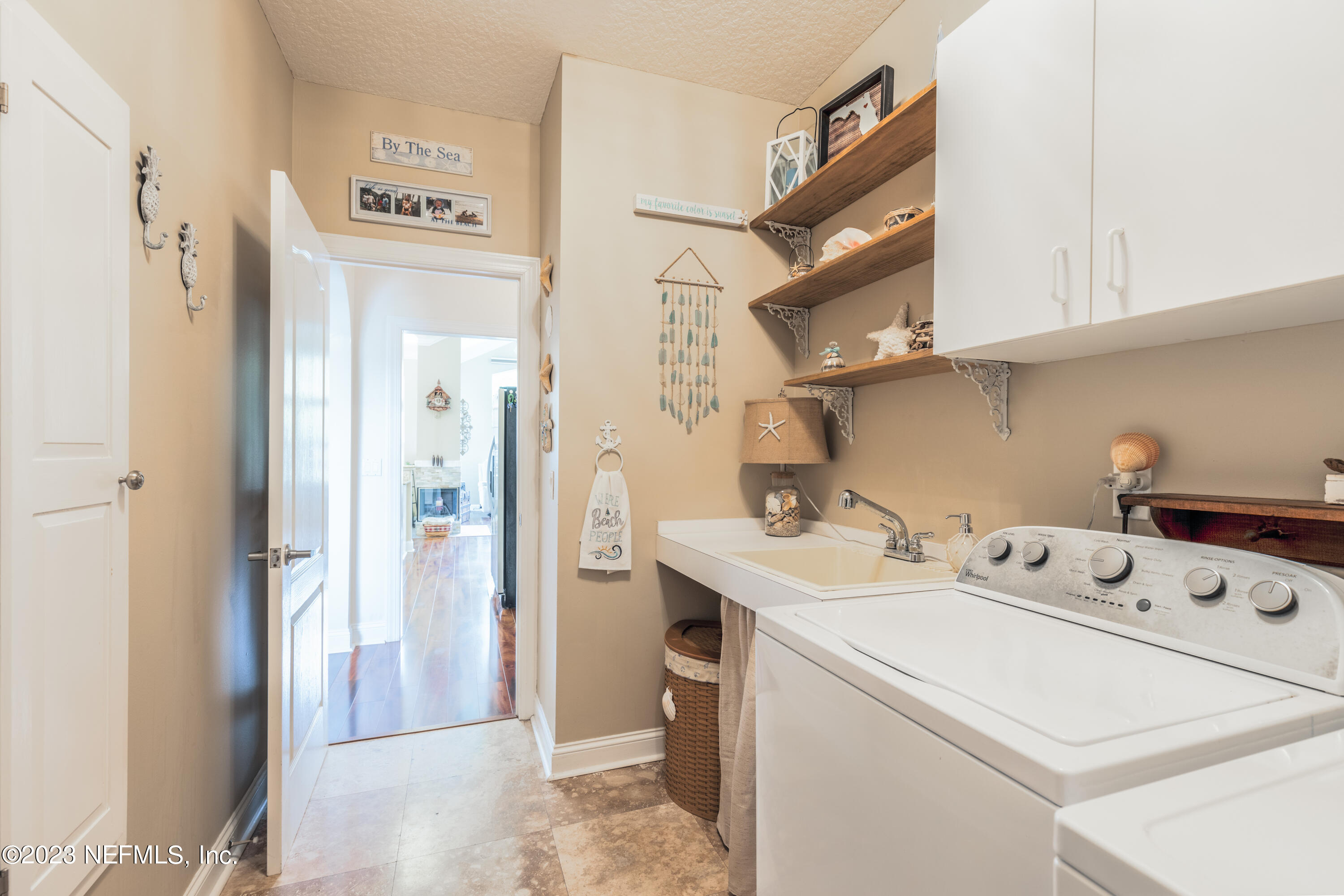 729 Cherry Grove Road Orange Park, FL 32073 - Photo 35 of 47 a utility room with dryer and washer