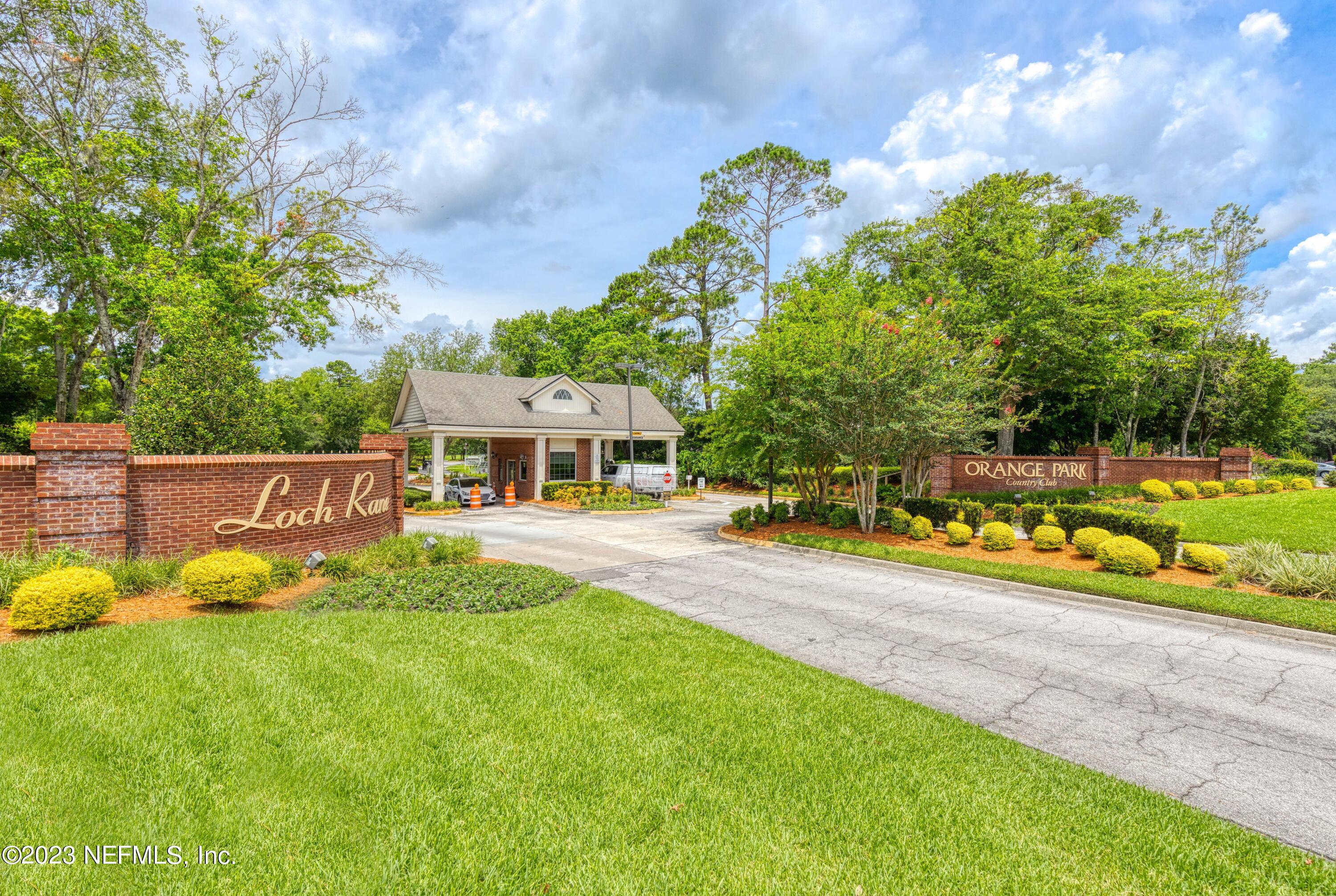 729 Cherry Grove Road Orange Park, FL 32073 - Photo 40 of 47 a view of a house with swimming pool and yard