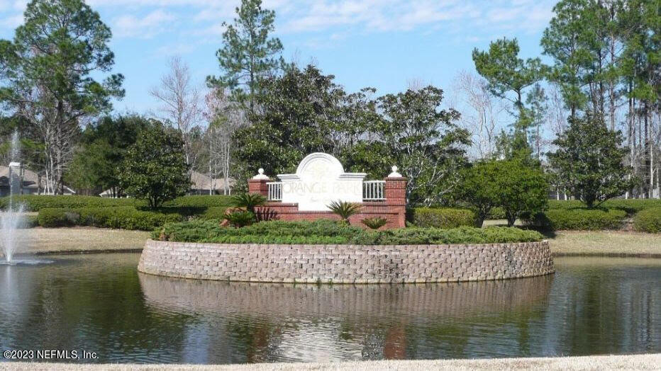 729 Cherry Grove Road Orange Park, FL 32073 - Photo 41 of 47 a view of a lake with a house in the background