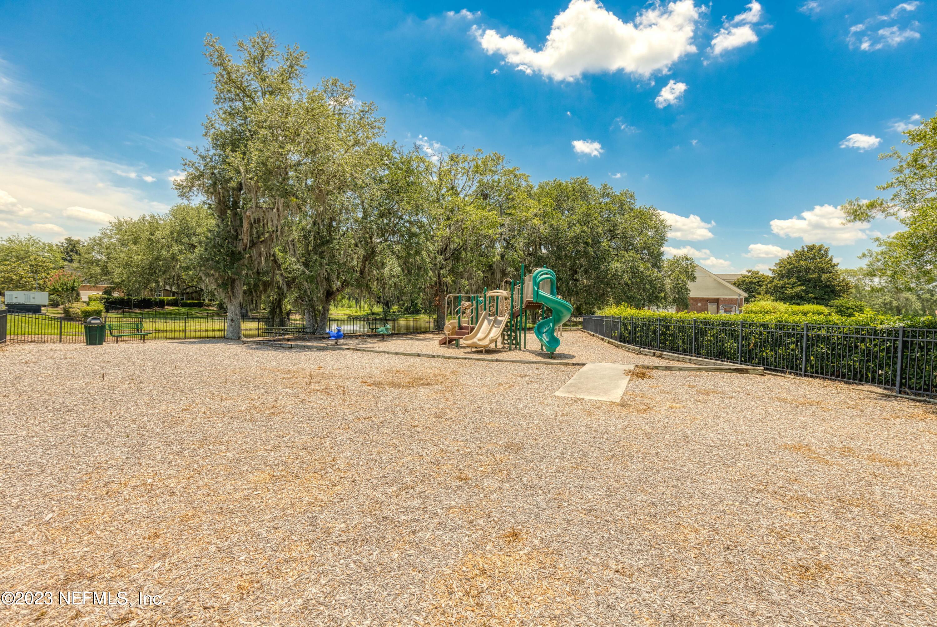 729 Cherry Grove Road Orange Park, FL 32073 - Photo 42 of 47 a view of road with trees