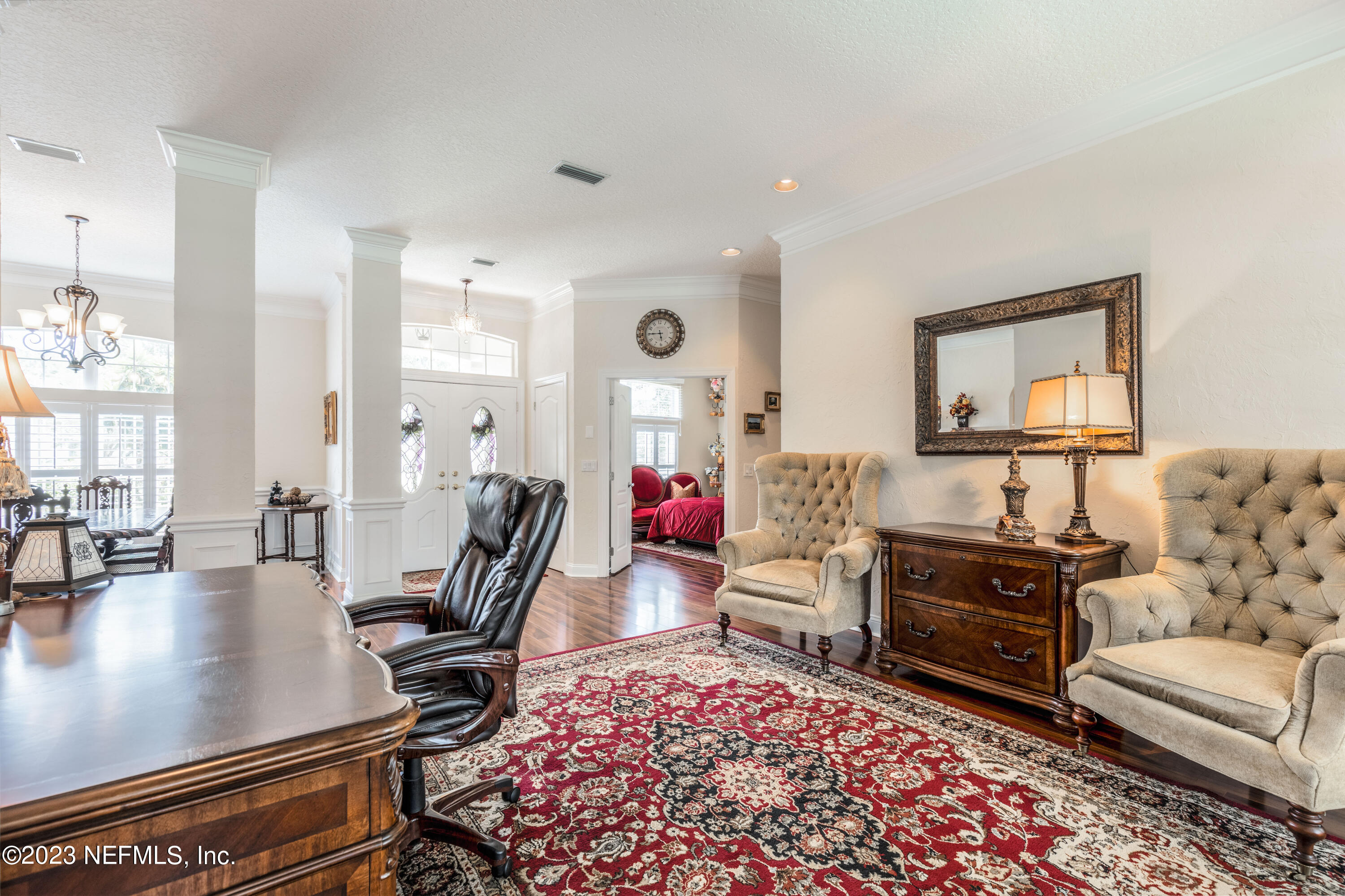 729 Cherry Grove Road Orange Park, FL 32073 - Photo 5 of 47 a living room with furniture and a flat screen tv