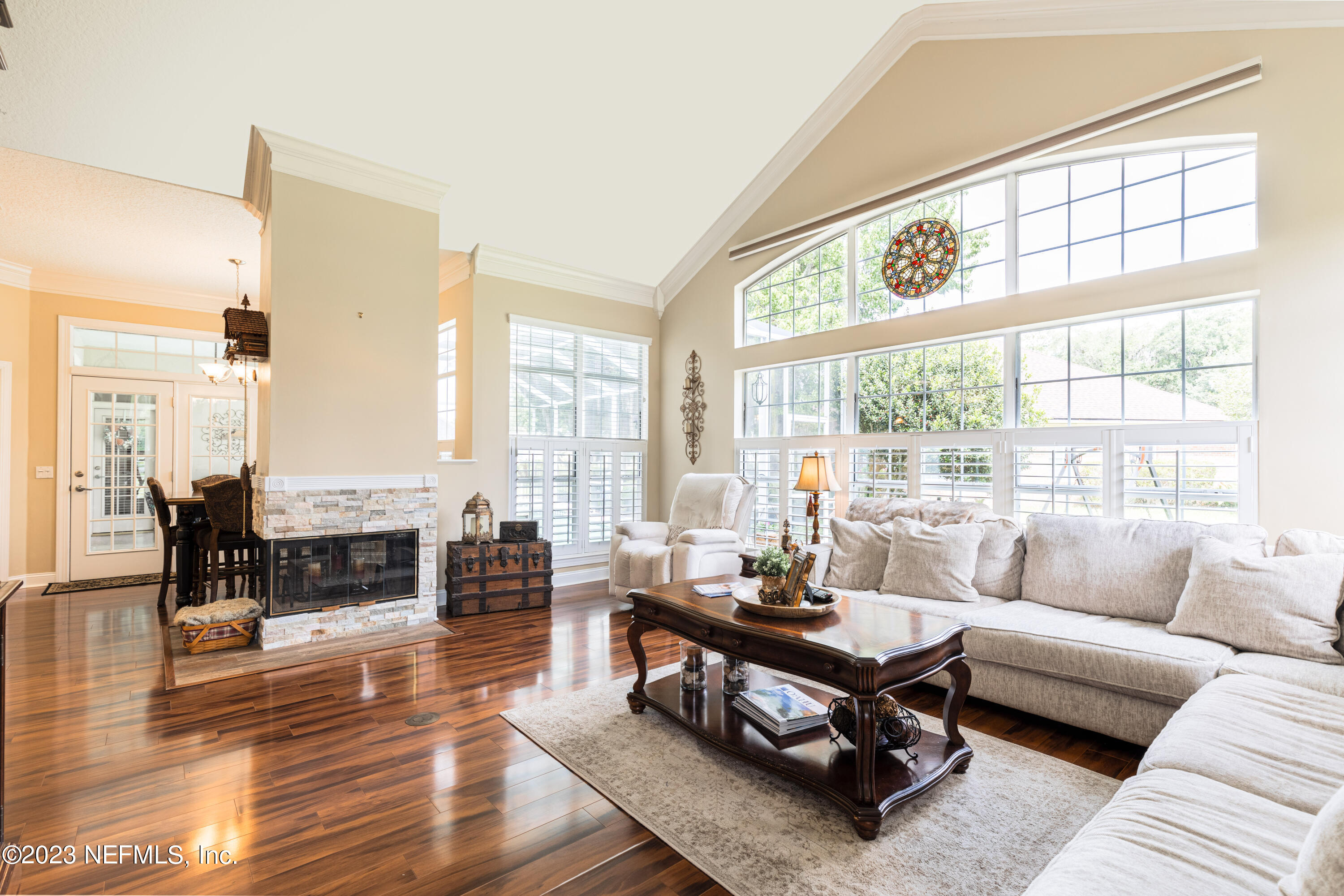 729 Cherry Grove Road Orange Park, FL 32073 - Photo 6 of 47 a living room with furniture large window and wooden floor