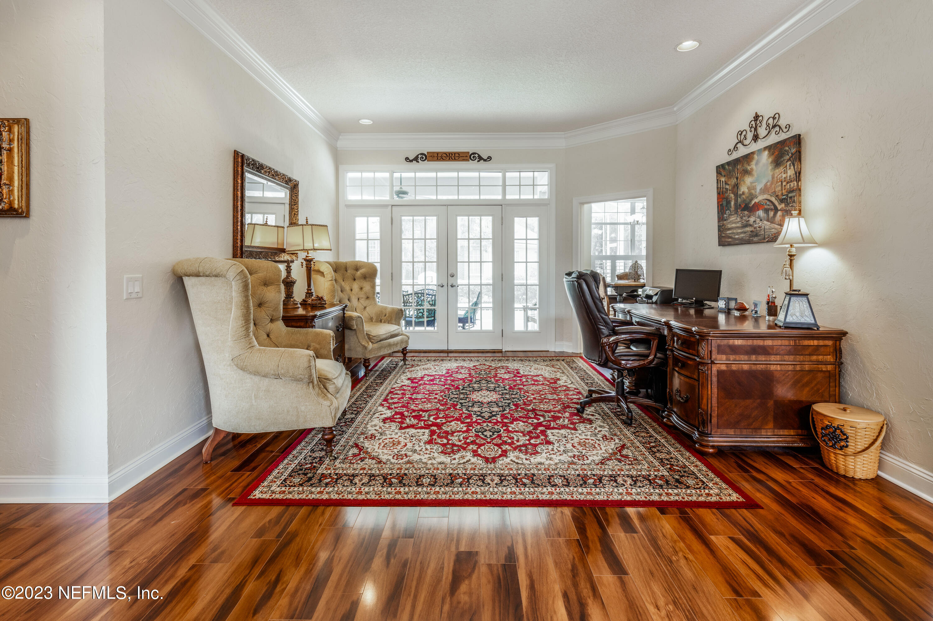 729 Cherry Grove Road Orange Park, FL 32073 - Photo 9 of 47 a living room with furniture rug and a table