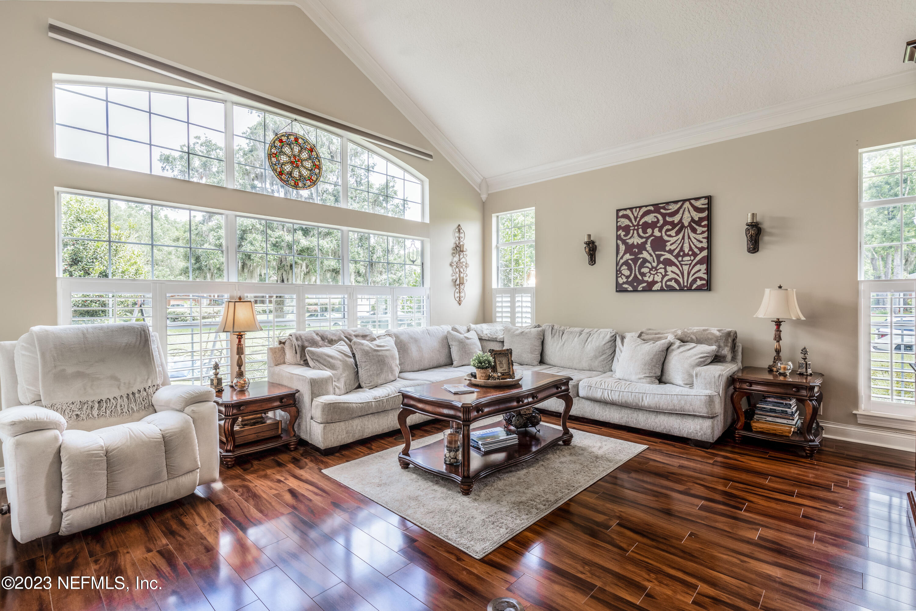 729 Cherry Grove Road Orange Park, FL 32073 - Photo 10 of 47 a living room with furniture and a large window