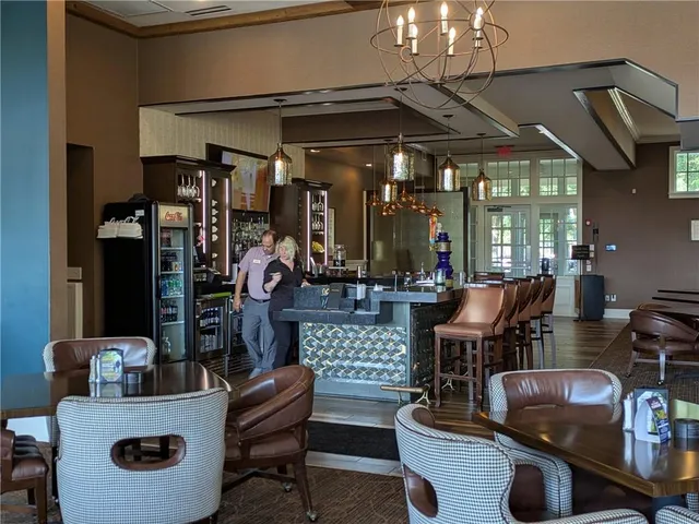 a room with furniture and a chandelier