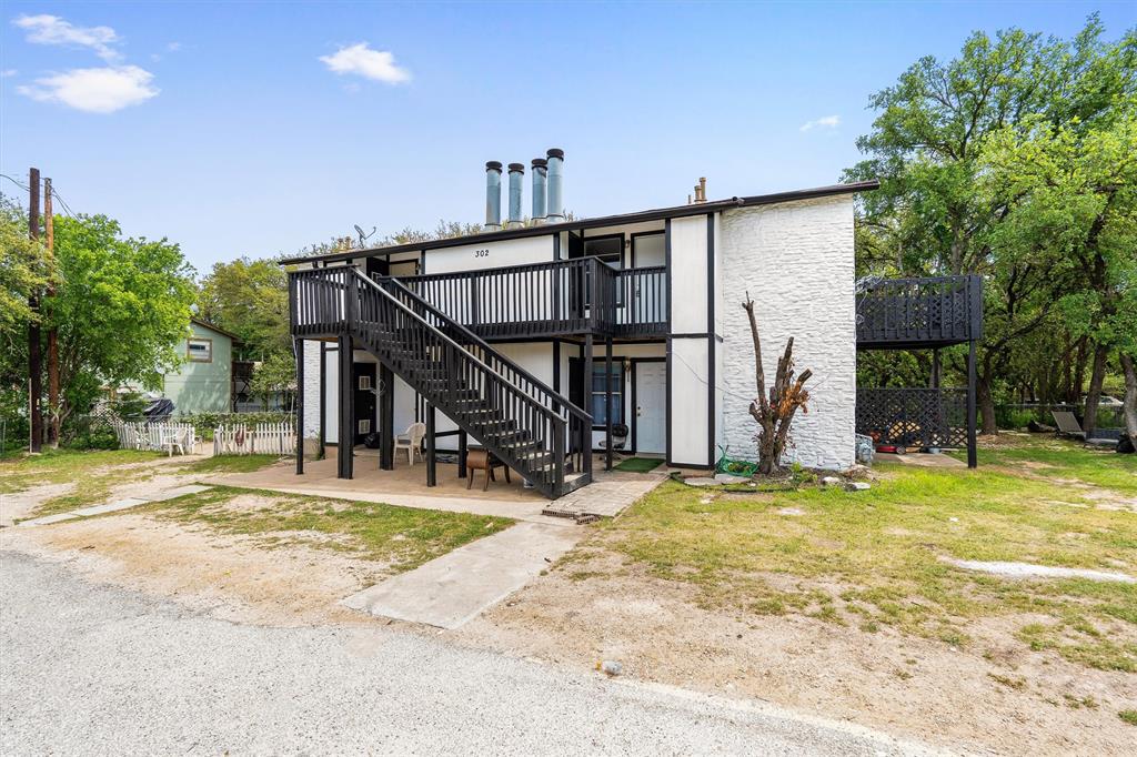 302 Hedgewood Drive, Unit C Georgetown, TX 78628 - Photo 1 of 1 a view of a house with swimming pool and sitting area