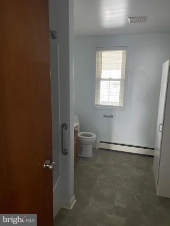 a view of a small space with a window