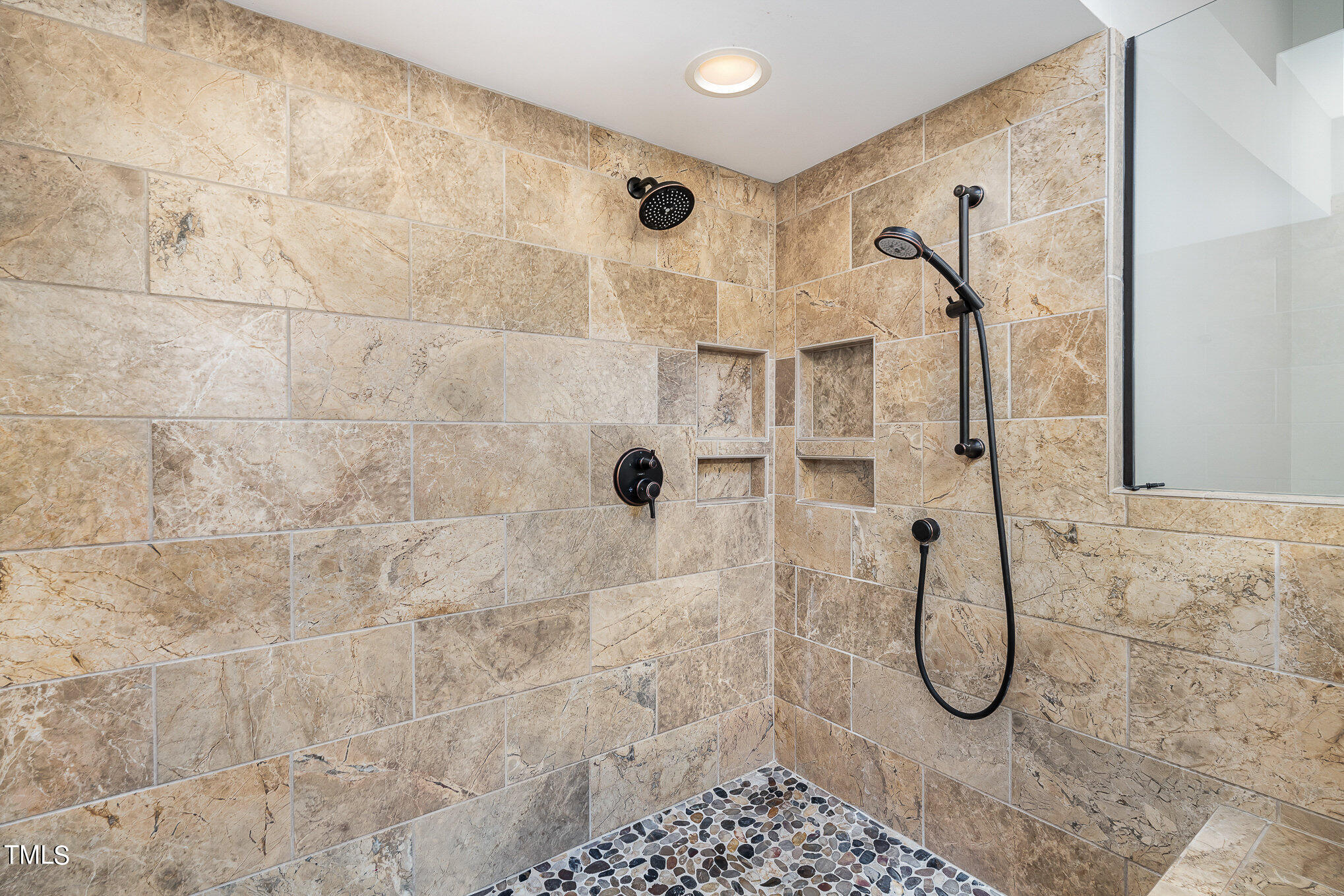 305 Fairwinds Drive Cary, NC 27518 - Photo 10 of 27 a bathroom with a shower