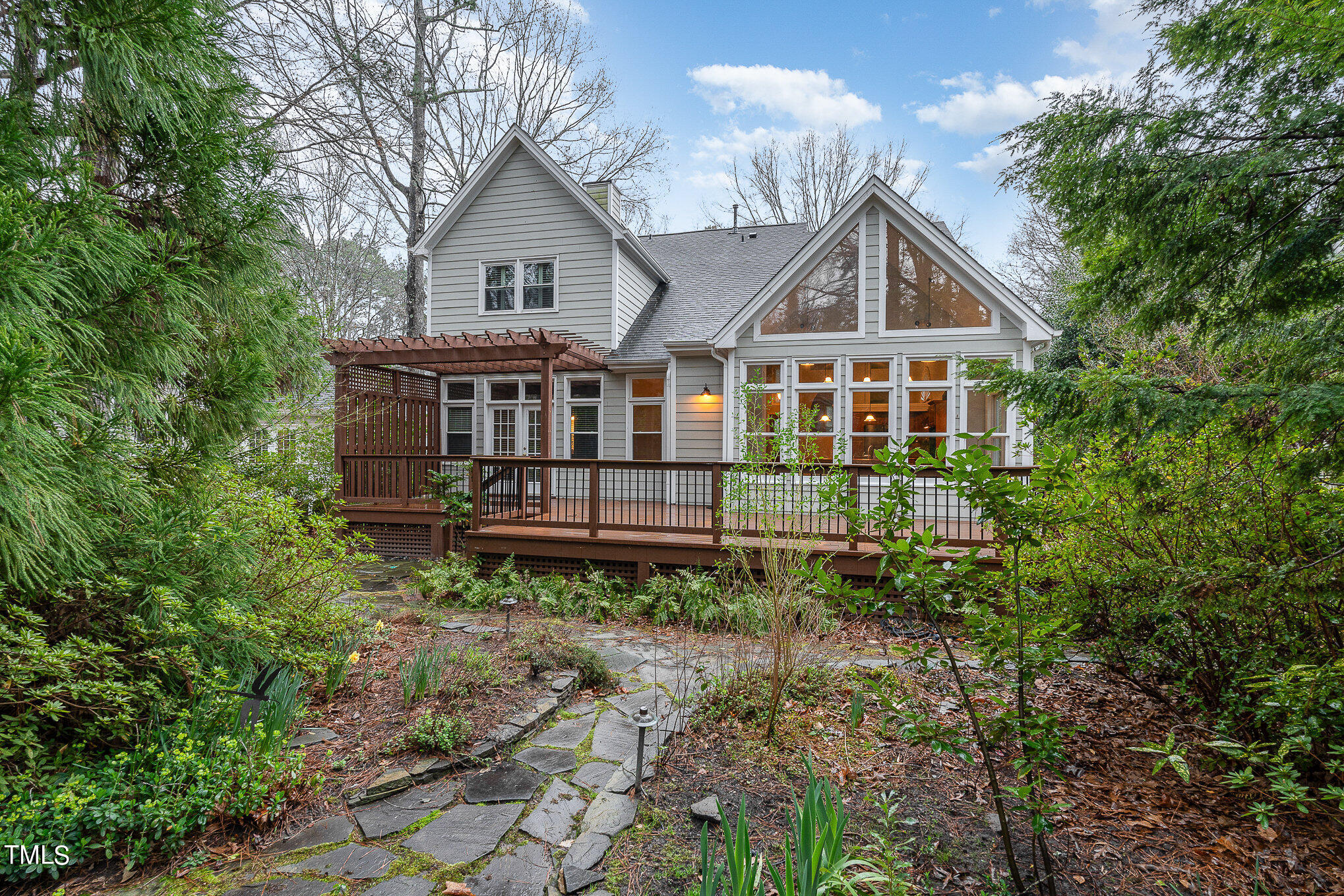 305 Fairwinds Drive Cary, NC 27518 - Photo 21 of 27 a view of a house with yard and sitting area