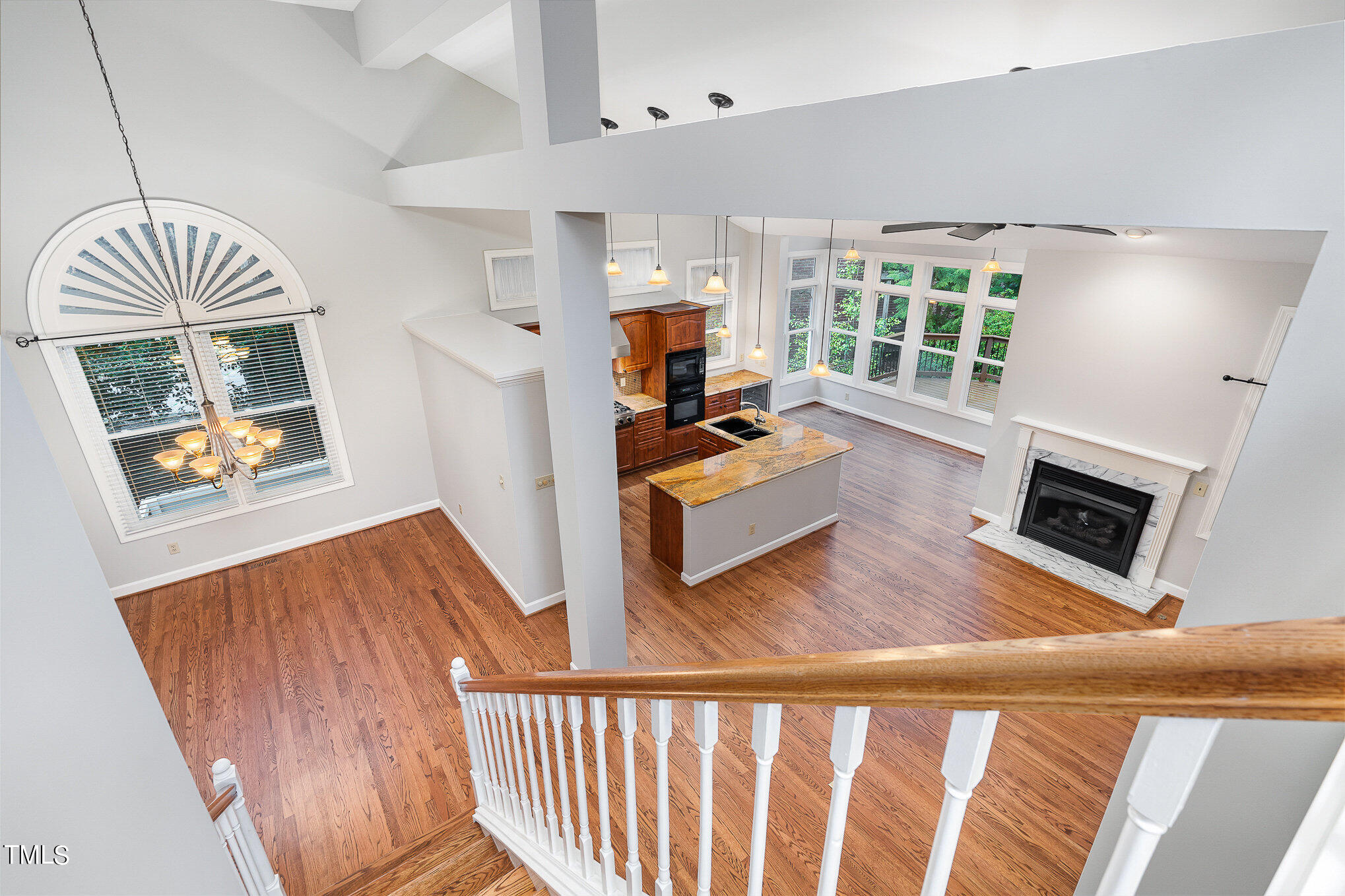 305 Fairwinds Drive Cary, NC 27518 - Photo 27 of 27 a living room with furniture and a fireplace