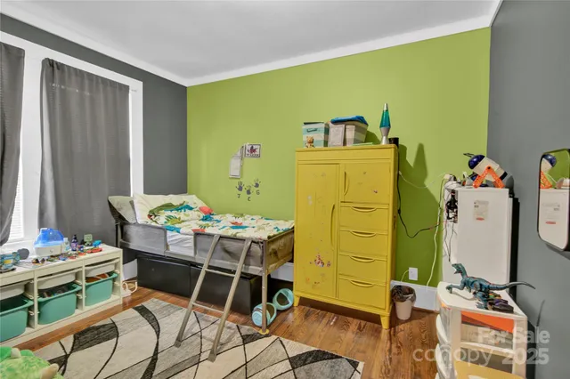 a view of a workspace with furniture and toys