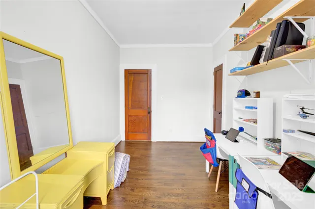 a view of a room with furniture and toys