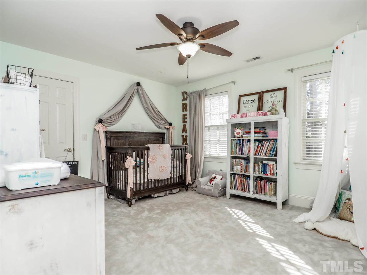 1408 Ridge Side Place Raleigh, NC 27613 - Photo 19 of 25 a living room with furniture and a fireplace