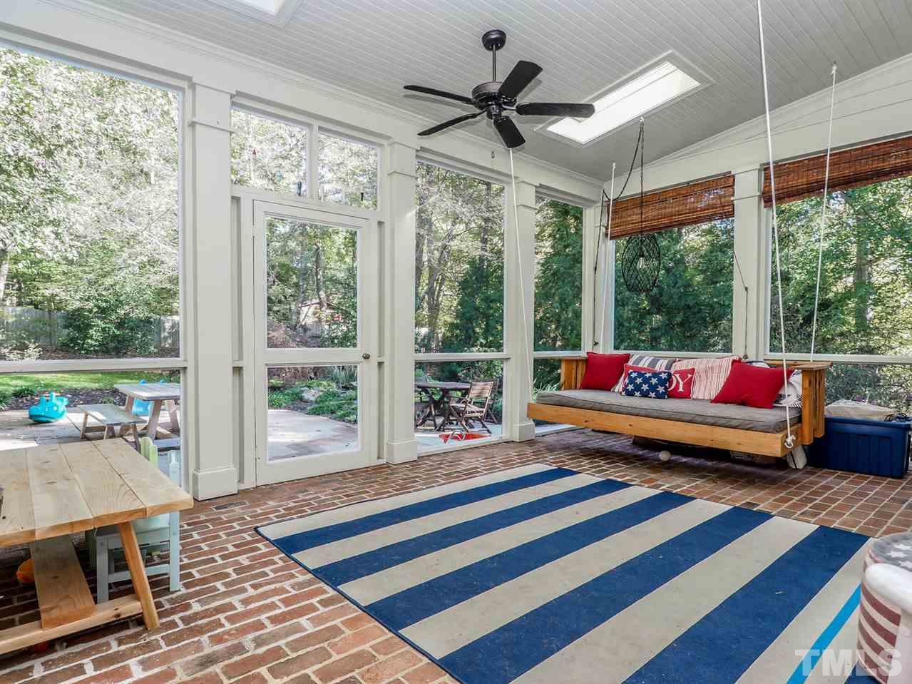 1408 Ridge Side Place Raleigh, NC 27613 - Photo 23 of 25 a bedroom with furniture and a large window