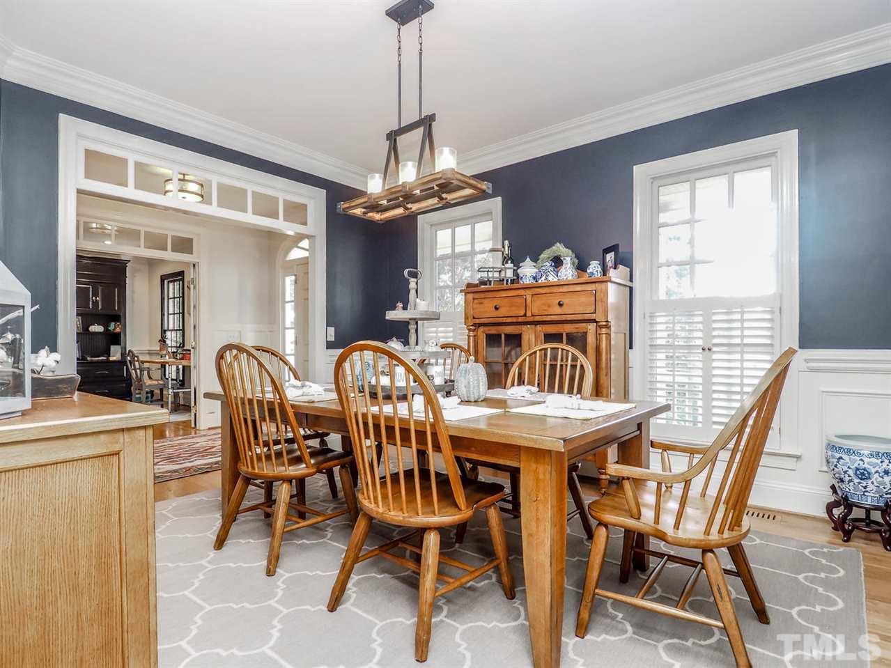 1408 Ridge Side Place Raleigh, NC 27613 - Photo 4 of 25 a view of a dining room with furniture