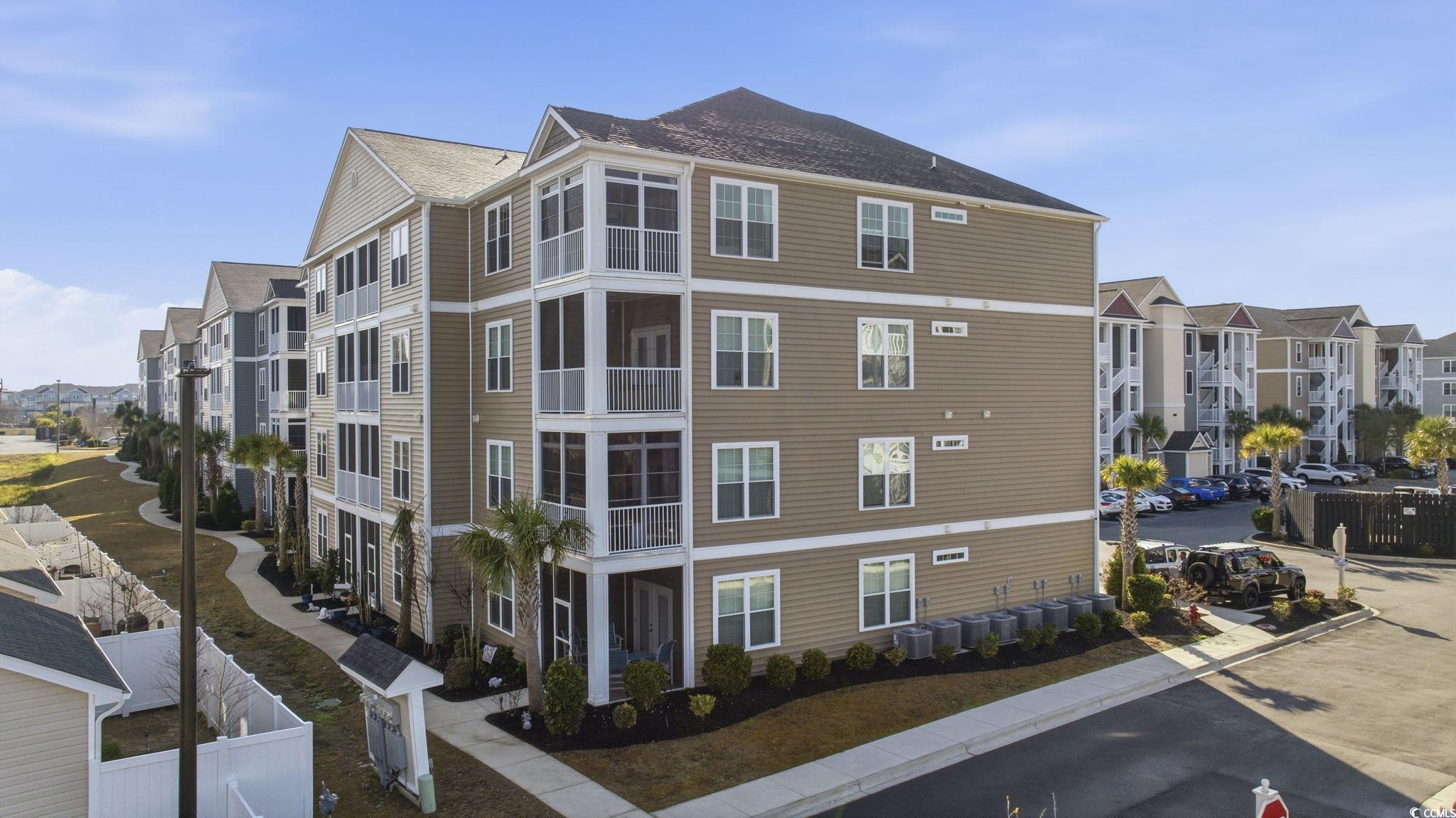 165 Ella Kinley Circle, Unit 302 Myrtle Beach, SC 29588 - Photo 23 of 38 View of apartment building / complex