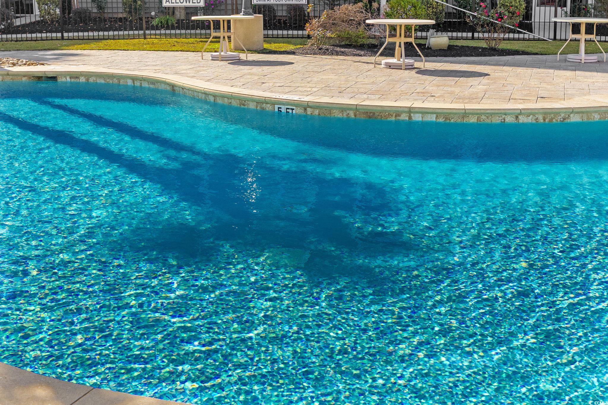 165 Ella Kinley Circle, Unit 302 Myrtle Beach, SC 29588 - Photo 37 of 38 View of swimming pool with a patio