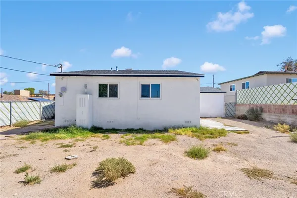 a view of a backyard of a house