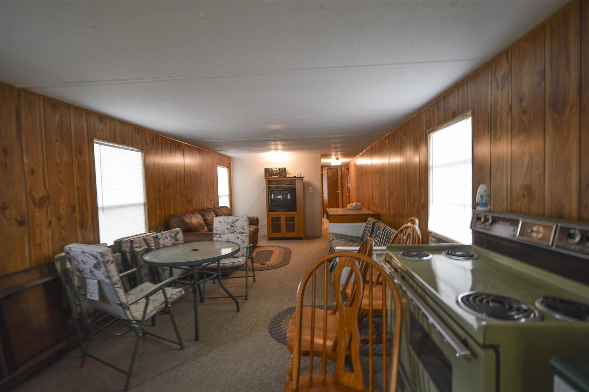 0 Tatum Road Pulaski, TN 38478 - Photo 26 of 30 a view of a dining room with furniture and chandelier