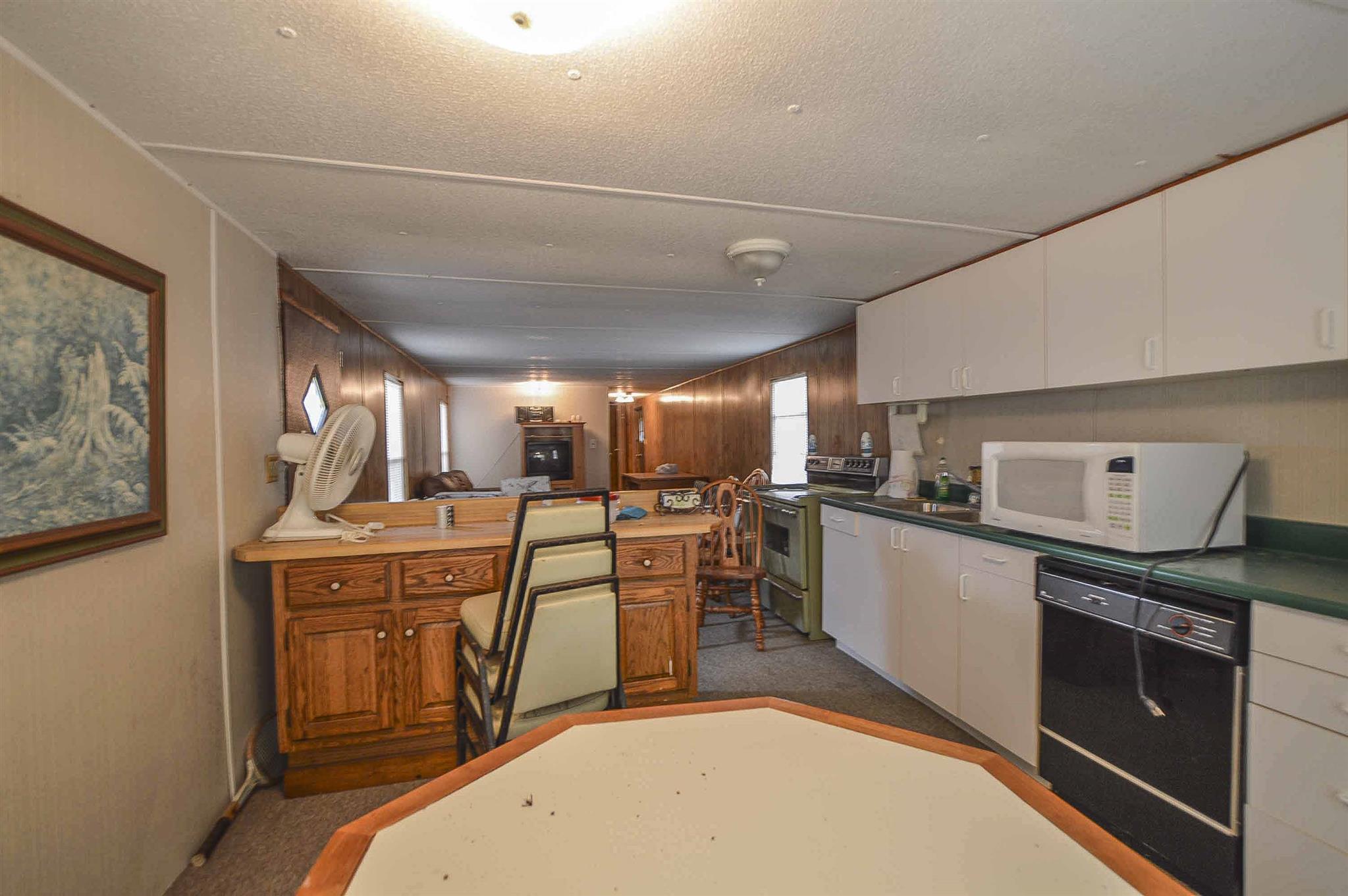 0 Tatum Road Pulaski, TN 38478 - Photo 27 of 30 a kitchen with a sink a stove and cabinets