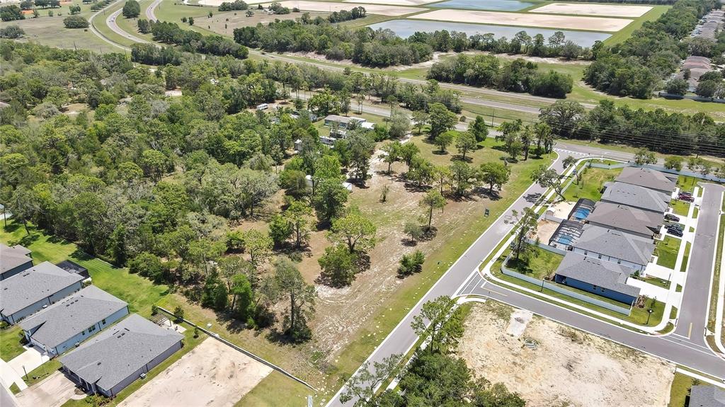 1087 Anderson Snow Road Spring Hill, FL 34609 - Photo 6 of 10 an aerial view of a house