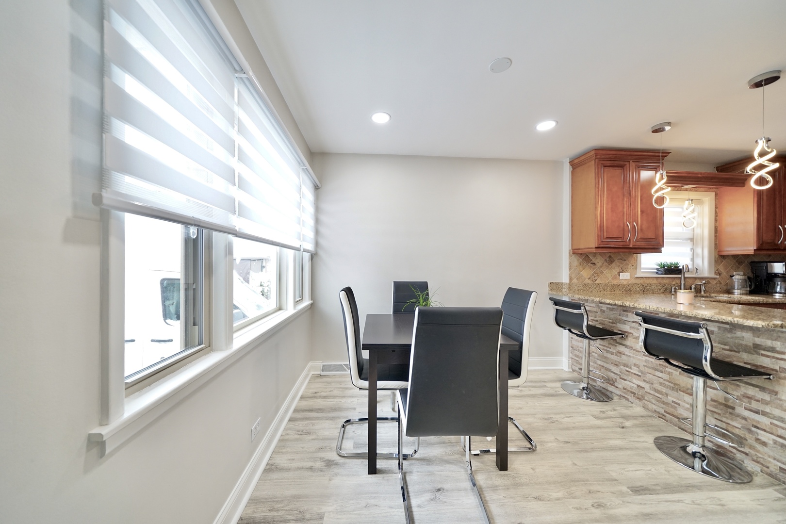 7122 Agatite Avenue Norridge, IL 60706 - Photo 26 of 64 a view of a dining room with furniture