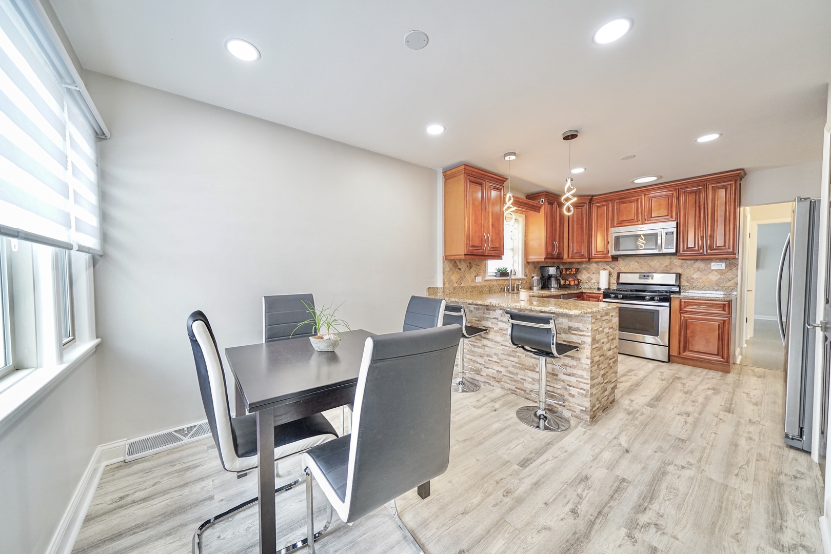 7122 Agatite Avenue Norridge, IL 60706 - Photo 27 of 64 a view of a dining room with furniture