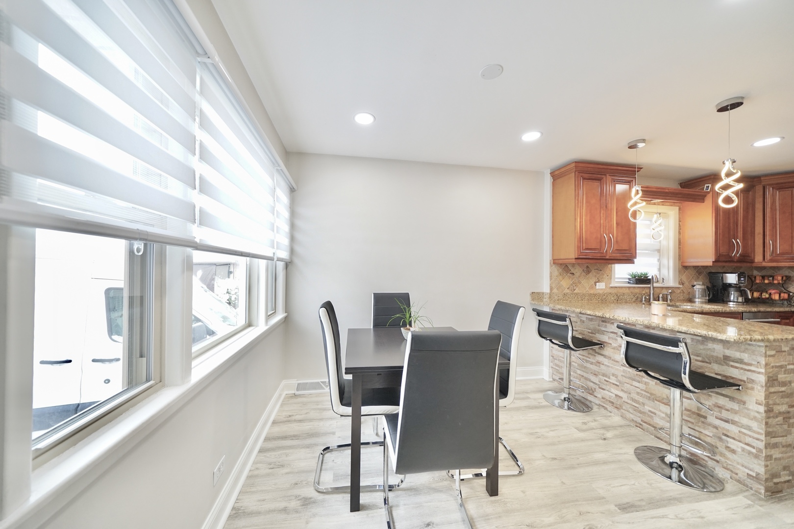 7122 Agatite Avenue Norridge, IL 60706 - Photo 28 of 64 a view of a dining room with furniture