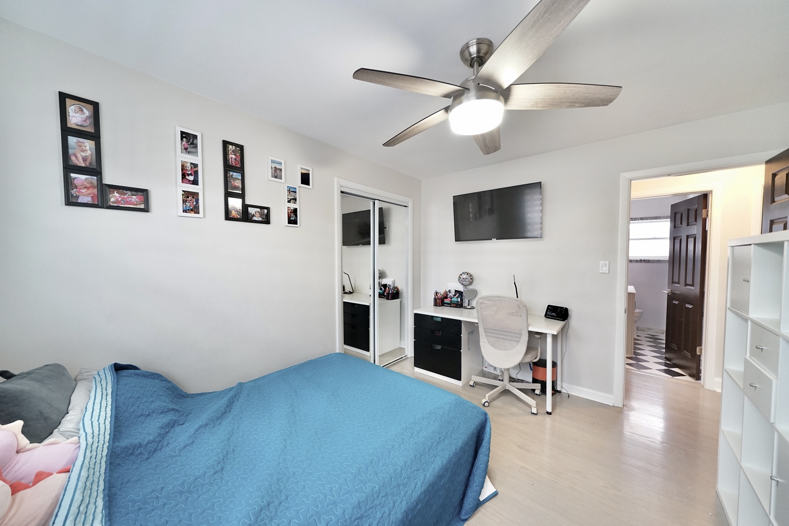 7122 Agatite Avenue Norridge, IL 60706 - Photo 37 of 64 a bedroom with a bed and a flat screen tv