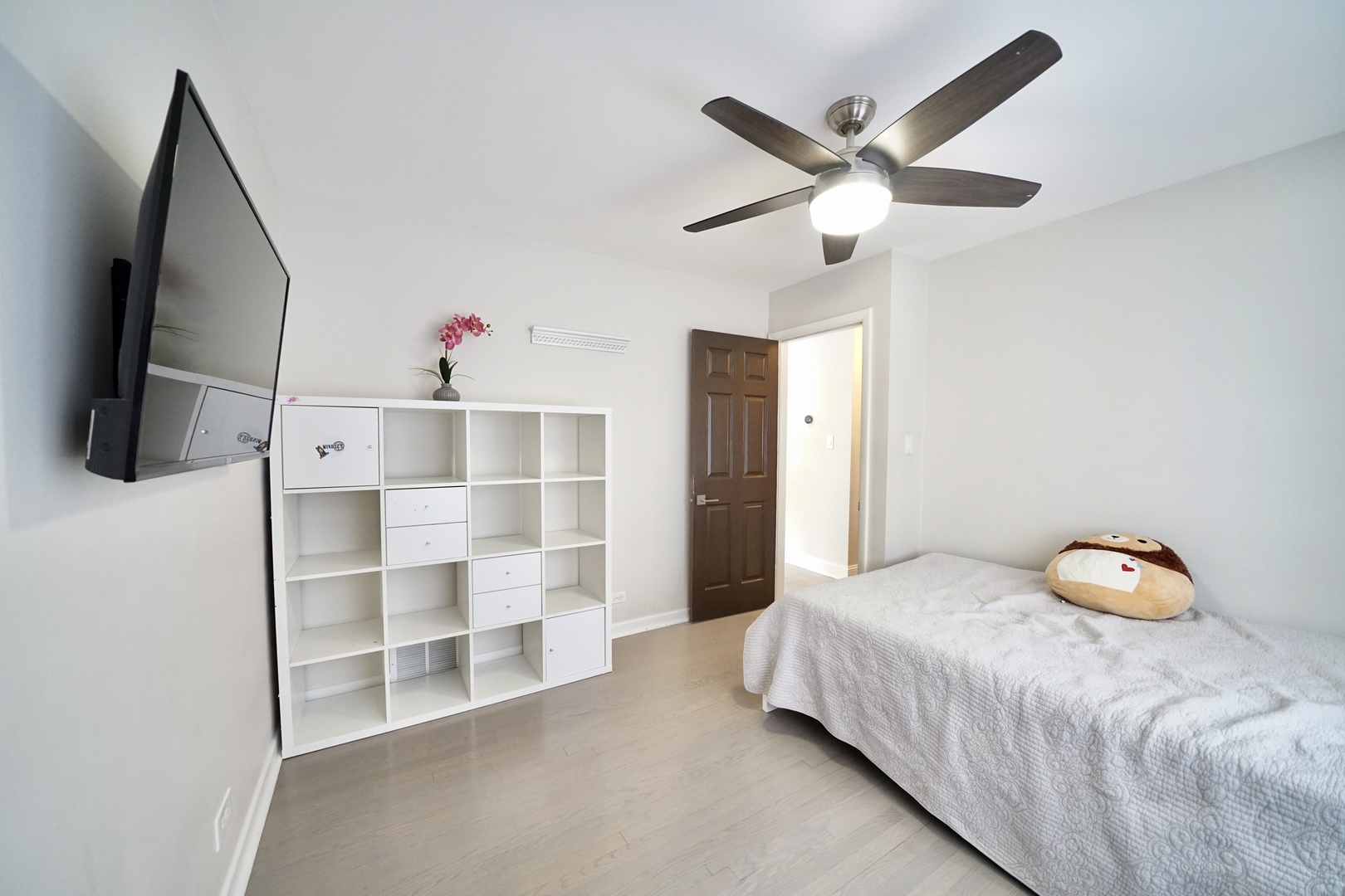 7122 Agatite Avenue Norridge, IL 60706 - Photo 38 of 64 a bedroom with a bed and a flat screen tv