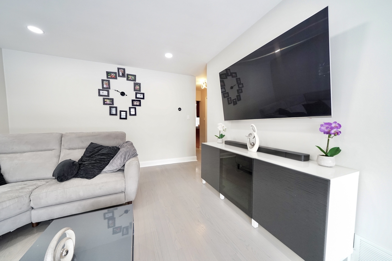 7122 Agatite Avenue Norridge, IL 60706 - Photo 4 of 64 a living room with furniture and a flat screen tv