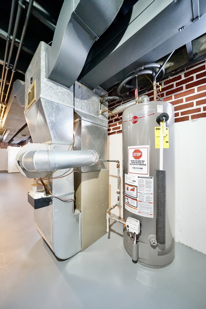 7122 Agatite Avenue Norridge, IL 60706 - Photo 55 of 64 a utility room with dryer and washer