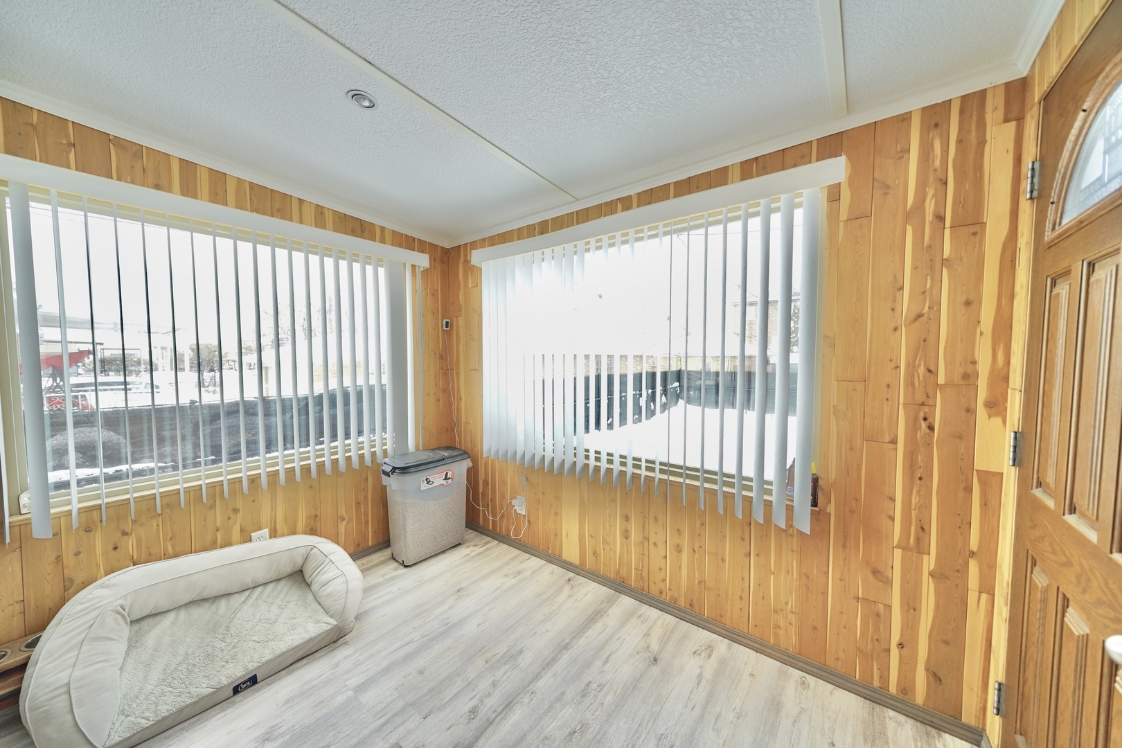 7122 Agatite Avenue Norridge, IL 60706 - Photo 60 of 64 a bedroom with a bed and wooden floor