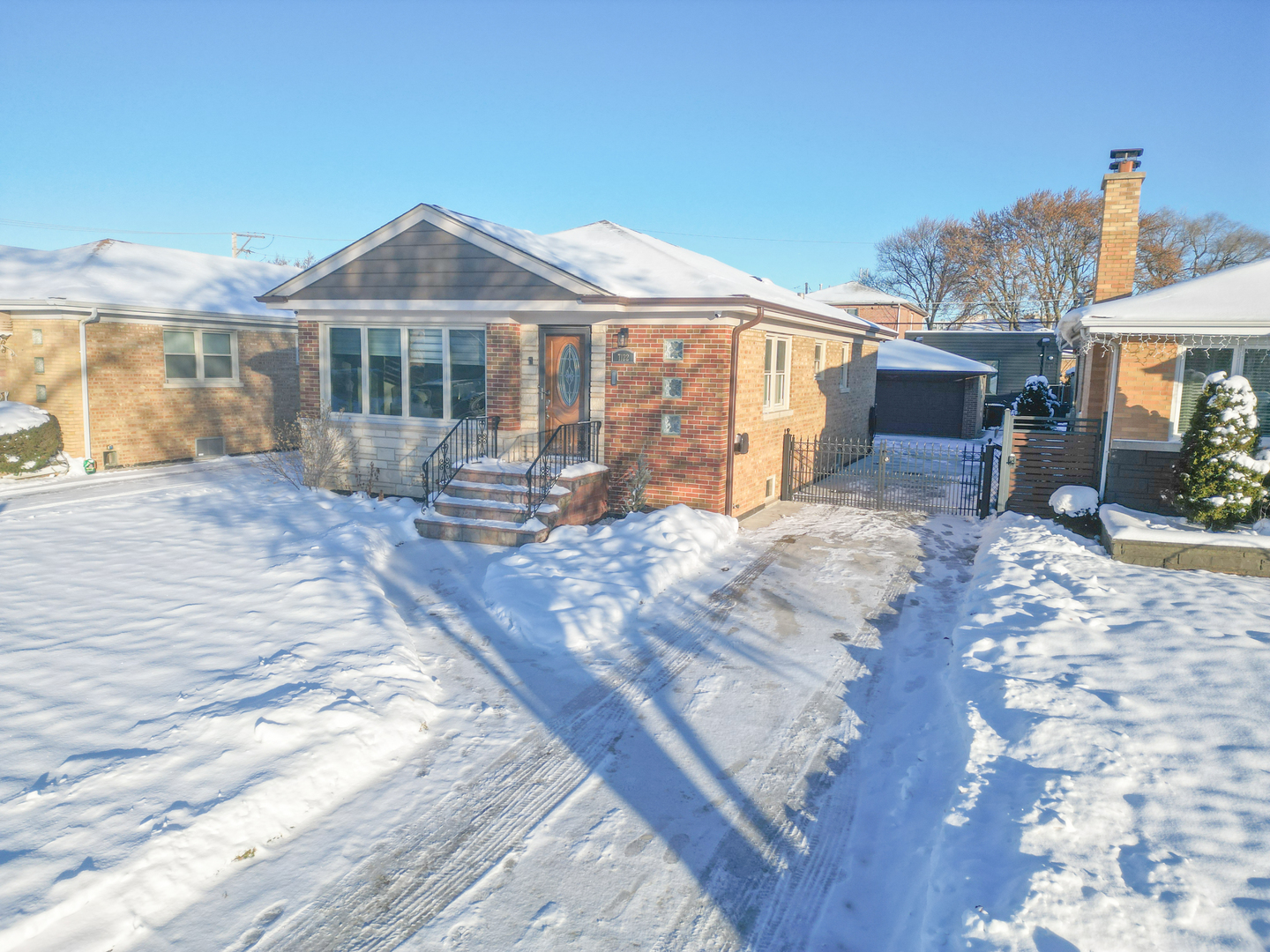 7122 Agatite Avenue Norridge, IL 60706 - Photo 63 of 64 a view of a house with a yard and sitting area