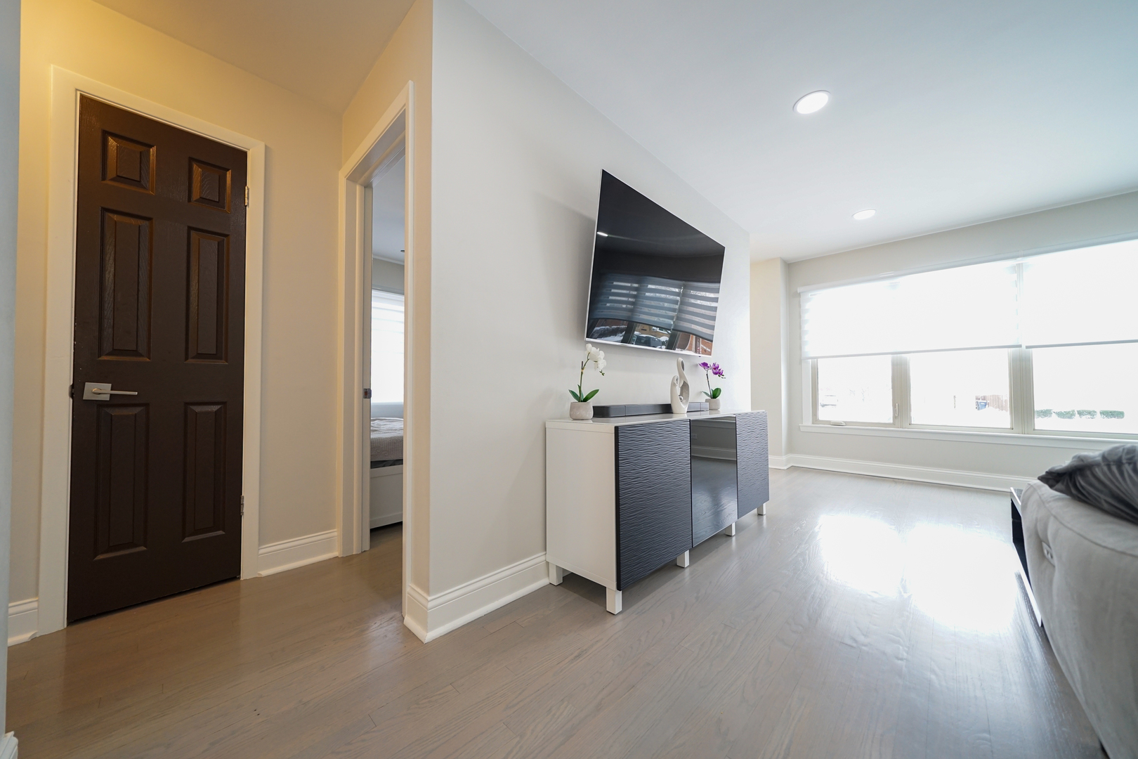 7122 Agatite Avenue Norridge, IL 60706 - Photo 8 of 64 a view of a kitchen with a sink a microwave and cabinets