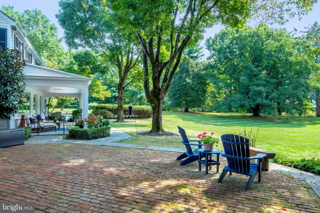 a view of a table and chairs in the patio
