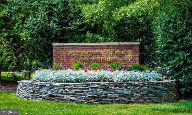 a front view of building with street view