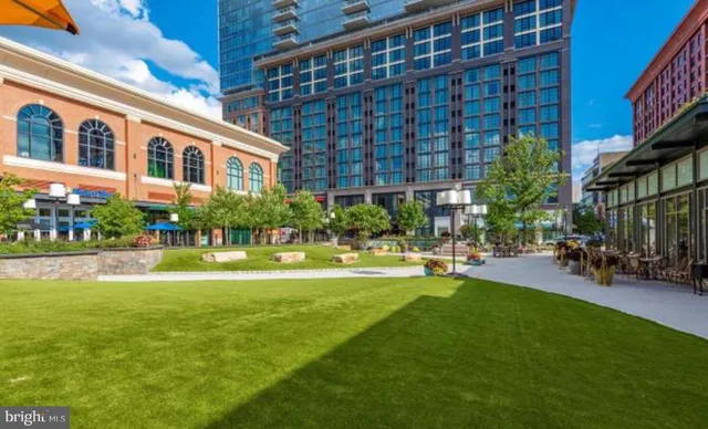 a view of a chairs and table in patio