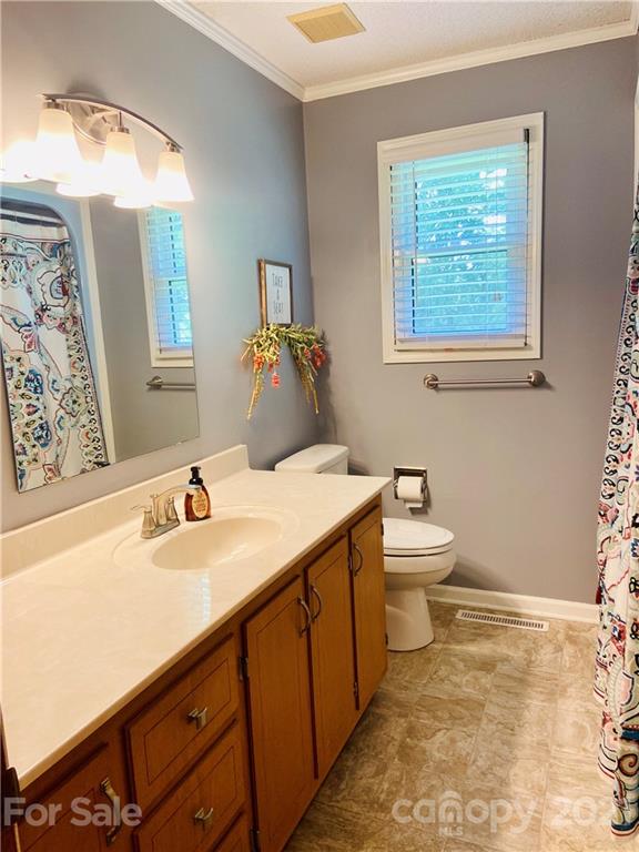 2120 Miller Road China Grove, NC 28023 - Photo 22 of 22 a bathroom with a sink and a mirror