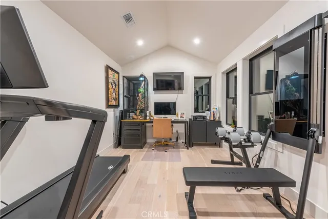 a view of a living room and dining room
