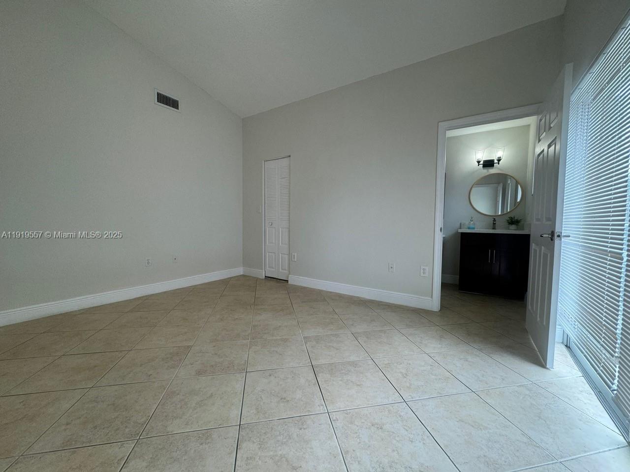 12833 Southwest 146th Terrace Miami, FL 33186 - Photo 14 of 29 a view of room with a sink and mirror