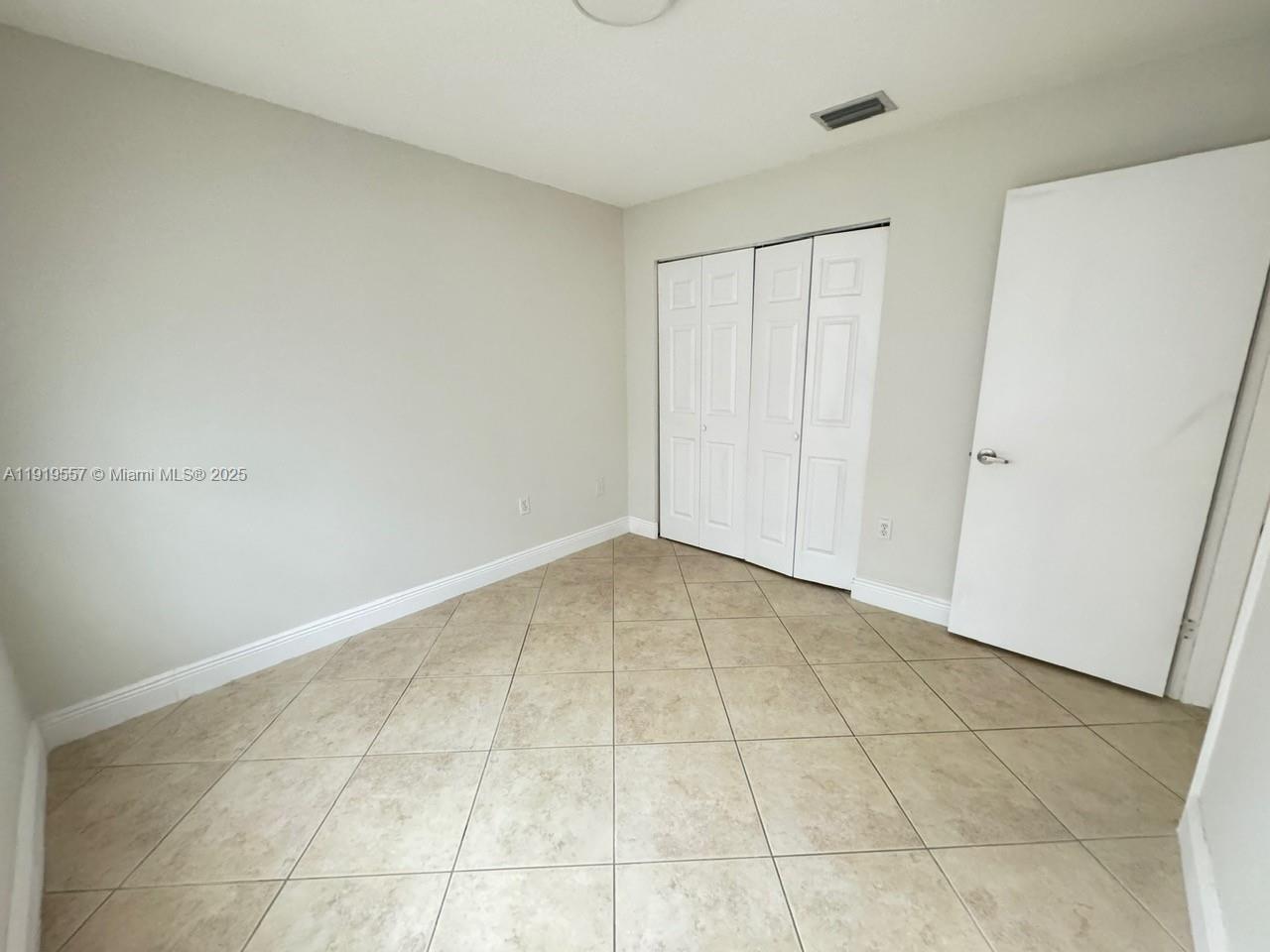 12833 Southwest 146th Terrace Miami, FL 33186 - Photo 25 of 29 a view of an empty room